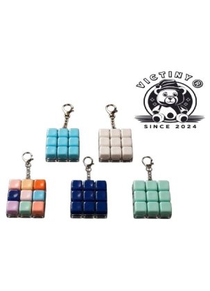 Jucarie interactiva breloc VICTINY pentru baieti, culoare random mini tastatura anti-stres culori pline lucios, 9 taste cu lumini