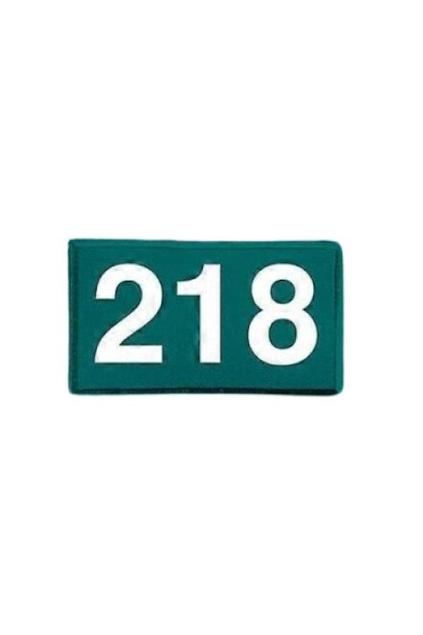 Emblema jucătorului 218, petice din Squid Game